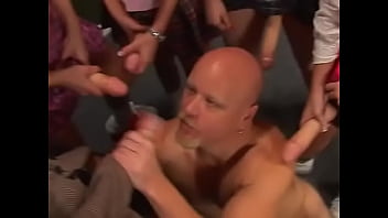 Bald pierced stud gets his asshole fucked by five sexy strapon wearing bitches