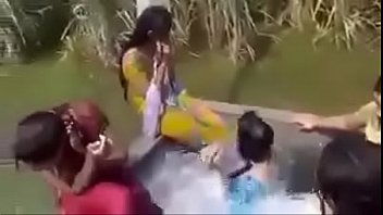 Girls bathing in village motor pump